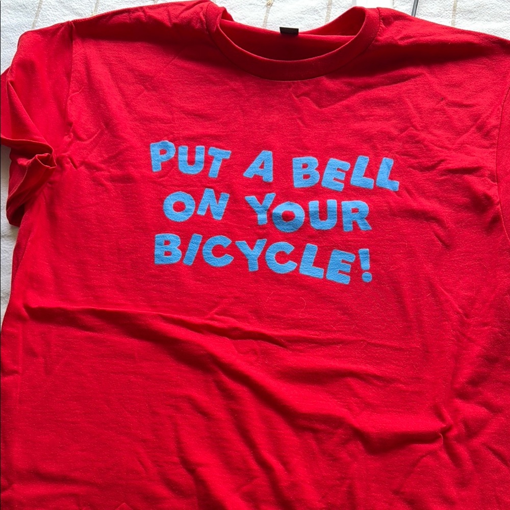 Red Graphic Tee with Blue 'Put a Bell on Your Bicycle' Text HARRY STYLES